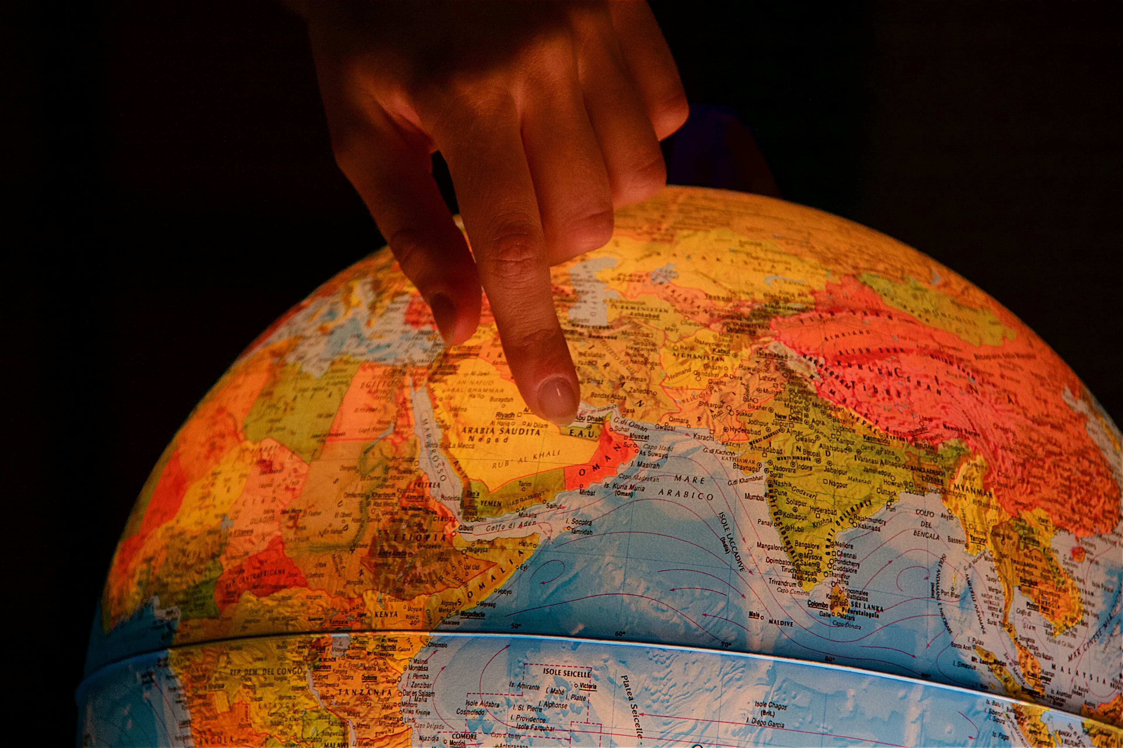 Pointing to Globe